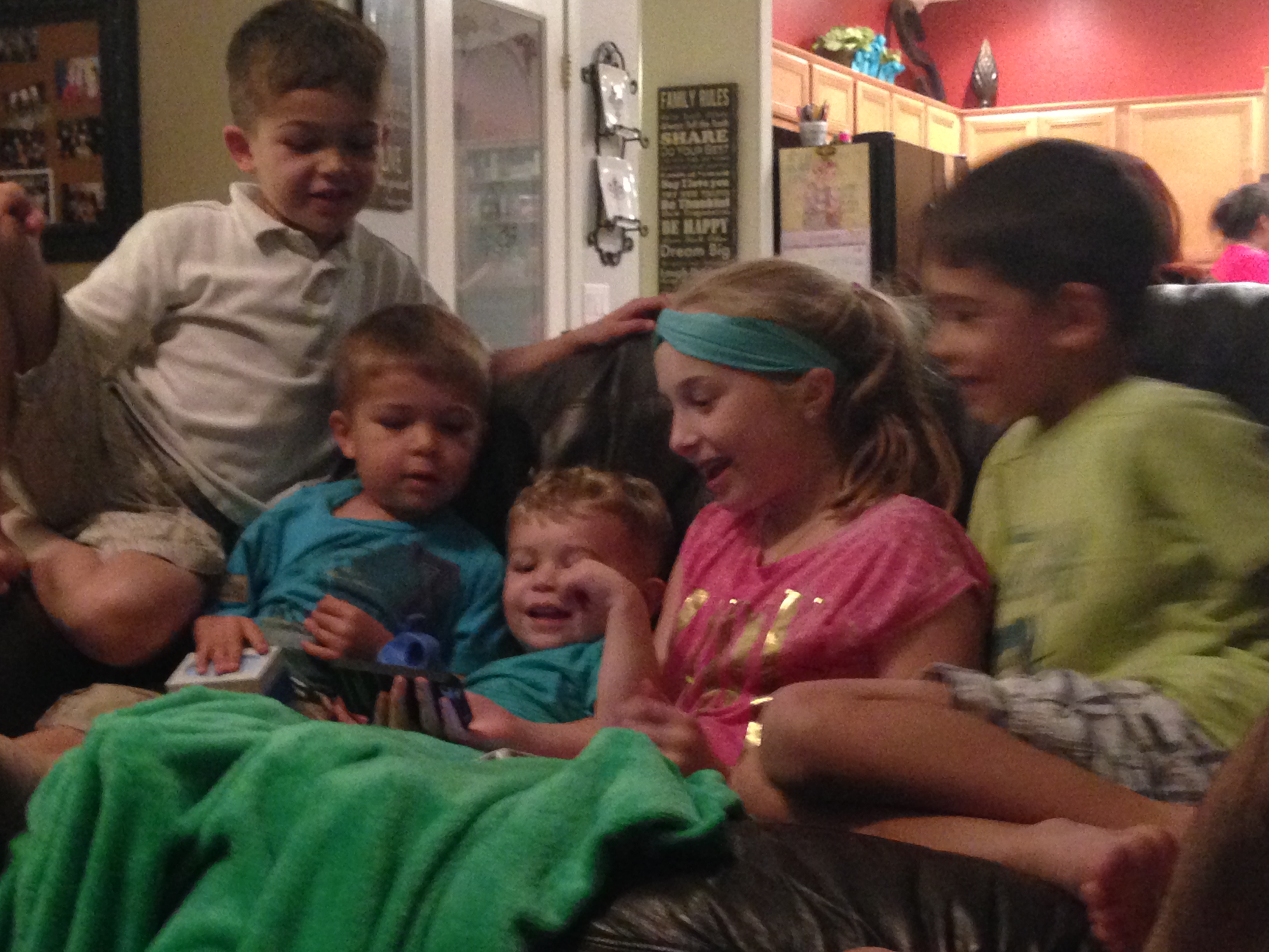 Ari and her boys she begs me to adopt! I got plenty of snapshots of the boys and my girls loving Michelle's newest 5 lb niece but none Taylor looking handsome in his baptism suit. You'll have to take my word for it